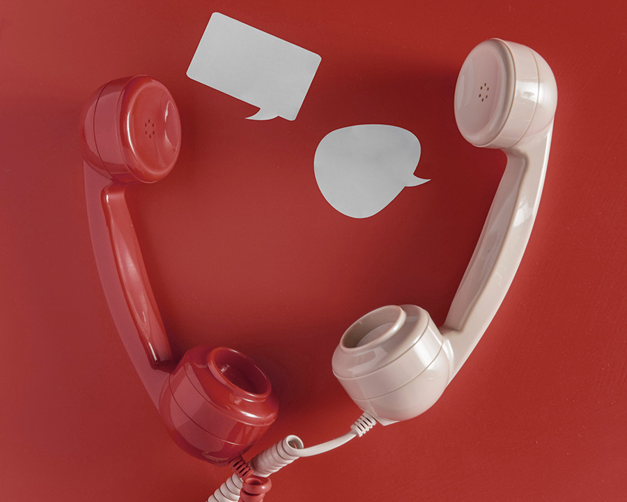 Két telefon a kapcsolatfelvétel illusztrációjában